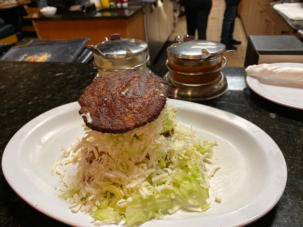 Q'Keenan Patacon with sweet plantains and shredded beef