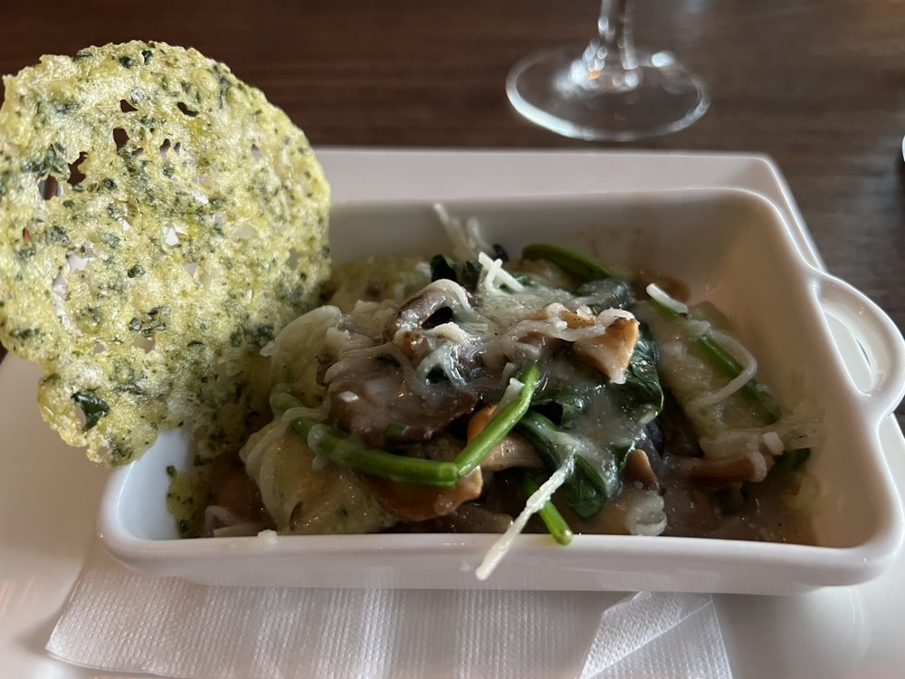 Gnocchi with spinach, mushrooms and truffle oil. Yum!