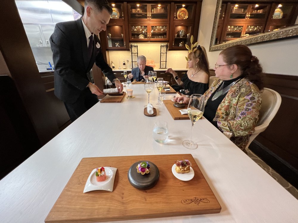 Starters at The Chef's Table: Seared Pink Pineapple  Langoustine Tartelette Cinco Jotas Iberico, Miso Caramel, "Éclair"